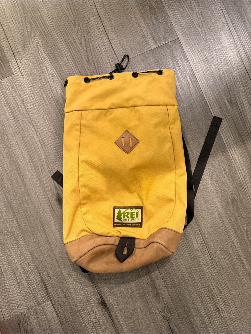 REI Yellow Canvas drawstring Backpack with leather Suede Base